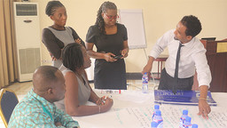 Stakeholders, including IIED's Fitsum Weldegiorgis (right), brainstorm to provide actionable solutions to challenges facing women in ASM during a workshop in Ghana (Photo: Friends of the Nation)