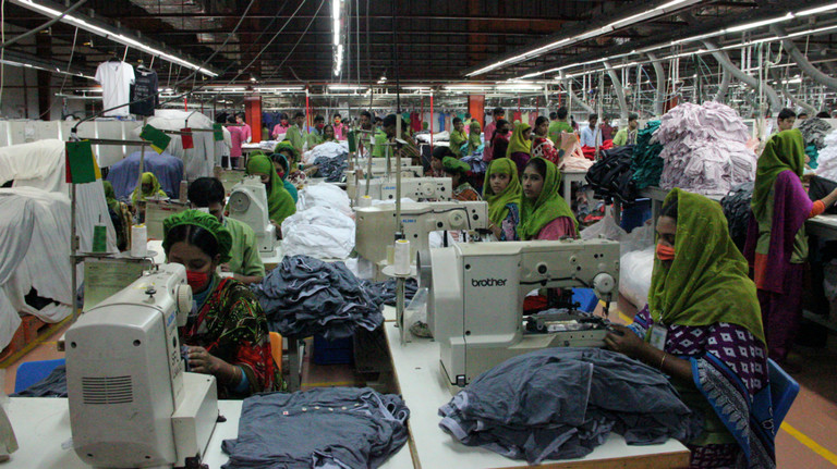 Women work in a knitwear factory